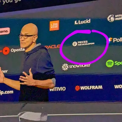 A keynote screen showing a grid of company logos, one circled in marker.